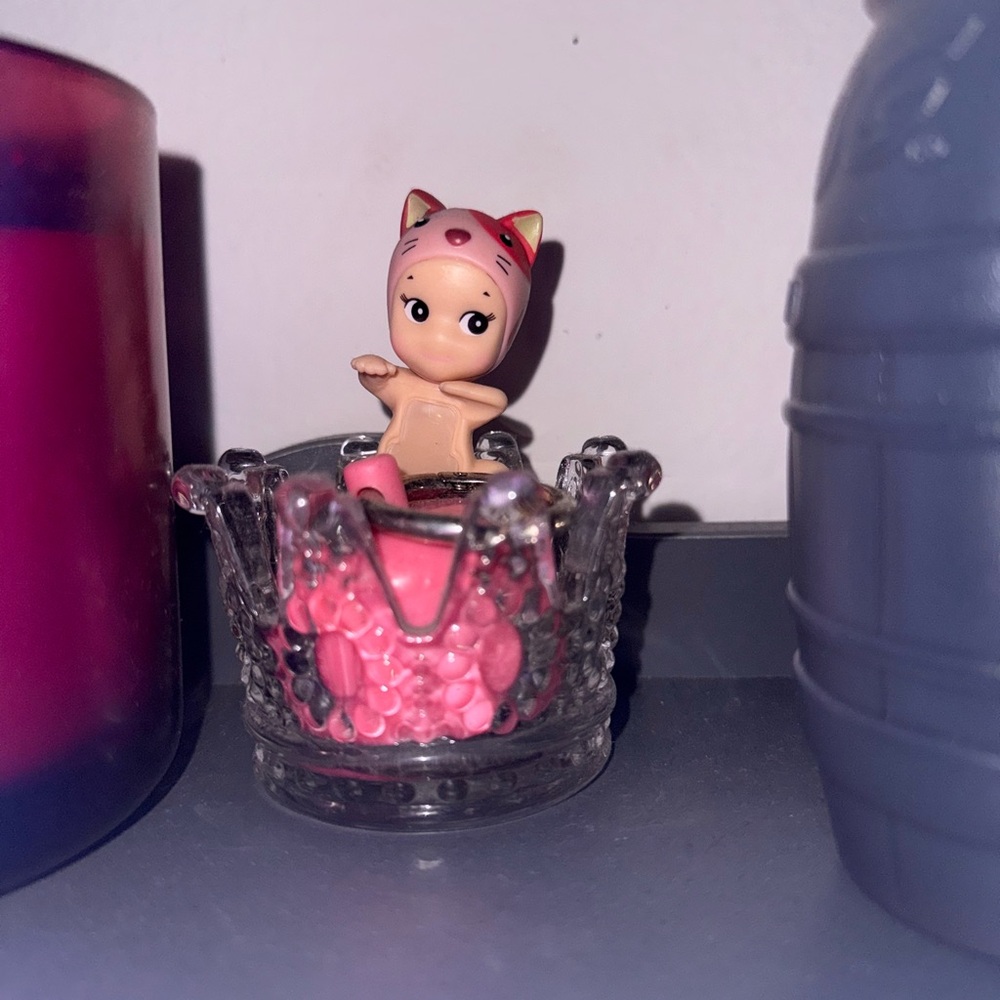 Charming Figurine in Glass Crown Holder